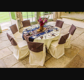 Twist on Tweed Chair Caps with Matching Napkin Cones and Table Runners on Butter Chair Covers