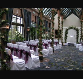 Rockliffe Hall Hotel, The Orangery, White Chair Covers and Wine Bows - Stunning!