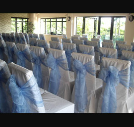 Powder Blue Bows on White Chair Covers at Heather Glen