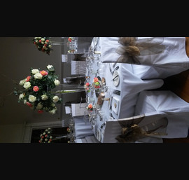 Bronze Sashes on White Chair Covers at Fasque House