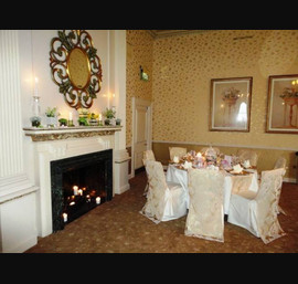 White linen chair cover with gold flock chair veil and matching gold flock table runner