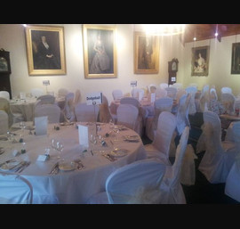 Champagne Sashes on White Chair Covers at Glen Tanar