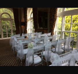 White bows on chiavari
