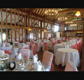 Coral Organza Sashes on White Chair Covers