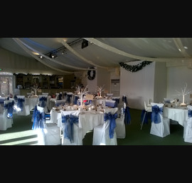 Silver and Blue Organza Double Bows on White Chair Covers