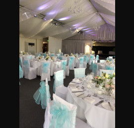 Aqua Organza Sashes on White Chair Covers