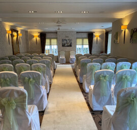 White Chair Covers with Sage Green Sash