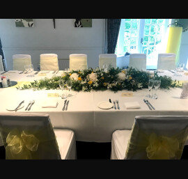 White Chair Covers with Yellow Sash