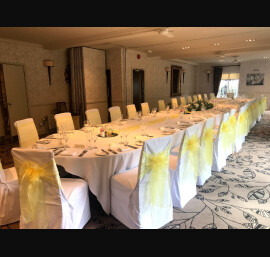 White Chair Cover with Yellow Sash