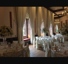 Ivory Ruffle Tail Hoods on Limewash Chiavari Chairs in The Drawing Room