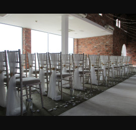 Ivory Chiffon Drapes on Limewash Chiavari Chairs in the Abbey Suite