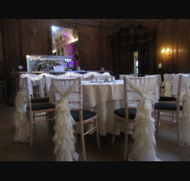 Ivory Ruffle Tail Hoods in The Music Room