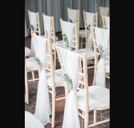 Ivory Chiffon Drapes on Limewash Chiavari Chairs at Delamere Manor