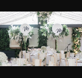 Ivory Chiffon Drapes on Limewash Chiavari Chairs at Delamere Manor