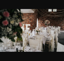 Ivory Ruffle Tail Hoods on Limewash Chiavari Chairs in The Great Hall