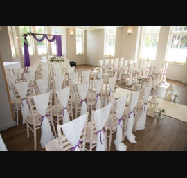 Ivory Chiffon Drapes on Limewash Chiavari Chairs at Delamere Manor