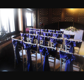 Purple Satin Bows on Limewash Chiavari Chairs