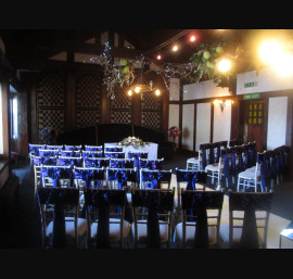 Purple Satin Bows on Limewash Chiavari Chairs