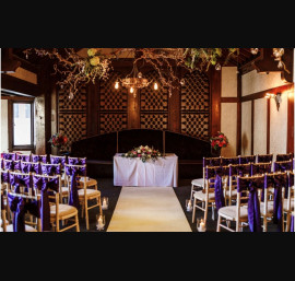 Purple Satin Bows on Limewash Chiavari Chairs