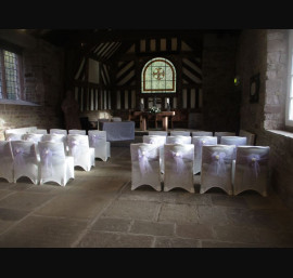 Lavender Organza Sashes on Ivory Chair Covers