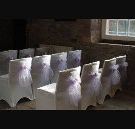 Lavender Organza Sashes on Ivory Chair Covers