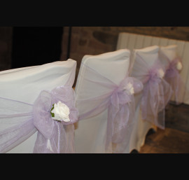 Lavender Organza Sashes on Ivory Chair Covers