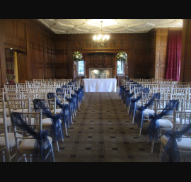 Navy Organza Sashes on Limewash Chiavari Chairs