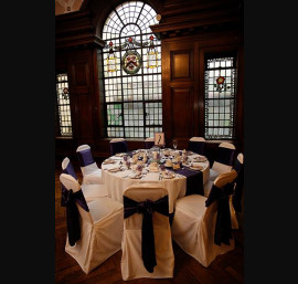 Purple Satin Bows on White Chair Covers