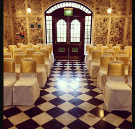 Gold Satin Bows on White Chair Covers