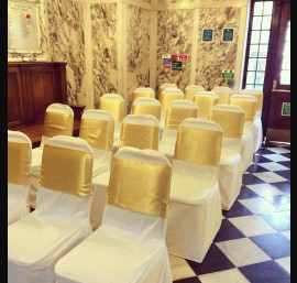 Gold Satin Bows on White Chair Covers