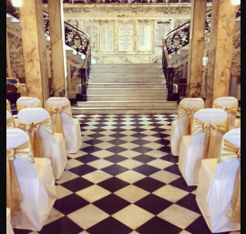 Gold Satin Bows on White Chair Covers