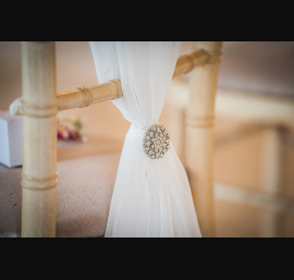 Ivory Chiffon Drape with Diamante Brooch in the Ceremony Room