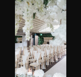 Ivory Chiffon Drapes on Limewash Chiavari Chairs at Delamere Manor