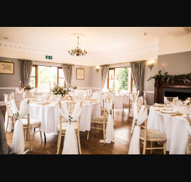 Chiffon Shoulder Drapes on Limewash Chiavari Chairs