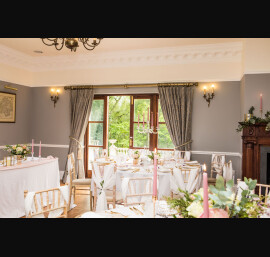 Chiffon Shoulder Drapes on Limewash Chiavari Chairs