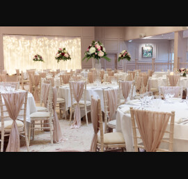 Pink Chiffon Drapes on Limewash Chiavari Chairs