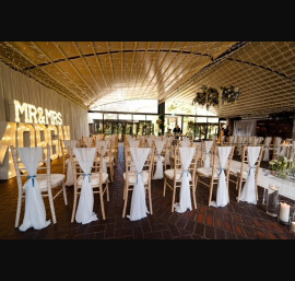 White Chiffon Drapes with Dusty Blue Ribbons at Delamere Manor