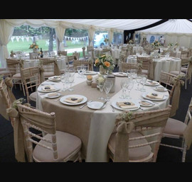 Burlap chair sashes tied onto chiavari chairs at St Fagans